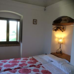 Cama ou camas em um quarto em Torre Mannella