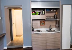 Kuchyň nebo kuchyňský kout v ubytování MONOLOCALE VICINO MILANO 2 + 9 fotografií