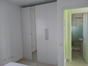 Posteľ alebo postele v izbe v ubytovaní Bungalow tranquillo e soleggiato + 28 fotografií
