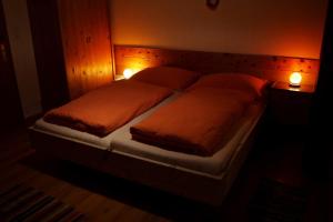 Postel nebo postele na pokoji v ubytování Ferienhaus Anderles-Alm
