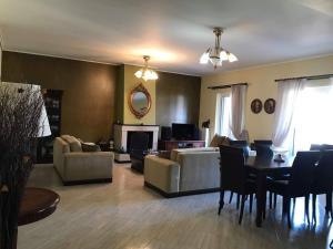 Posedenie v ubytovaní Luxury Apartment in the City