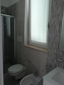 Kúpeľňa v ubytovaní Flamingo Rooms
