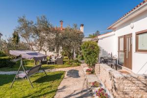 Vonkajšia záhrada v ubytovaní Wine Garden Holiday Home