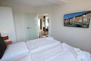 Ein Bett oder Betten in einem Zimmer der Unterkunft Haus Anna by Rujana