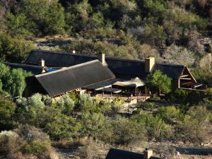 an overhead view of a building with trees and bushes at Bosch Luys Kloof Nature Reserve in Ladismith