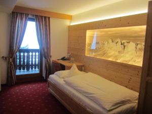 Postel nebo postele na pokoji v ubytování Hotel Ronce