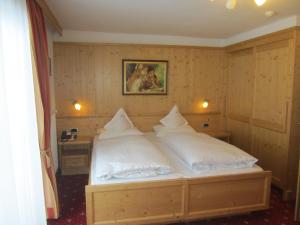Postel nebo postele na pokoji v ubytování Hotel Ronce