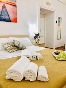Posteľ alebo postele v izbe v ubytovaní La Casa del Barocco