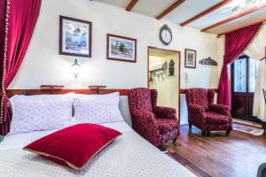 Posezení v ubytování Emperor's Suites