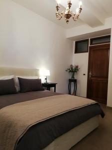 Postel nebo postele na pokoji v ubytování DreaMilan B&B