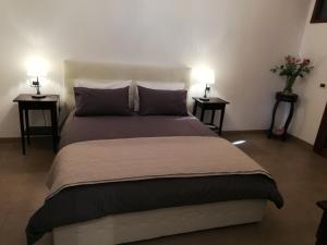 Postel nebo postele na pokoji v ubytování DreaMilan B&B