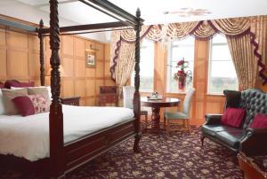 Postel nebo postele na pokoji v ubytování Earl Of Doncaster Hotel + 37 fotografií