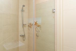 Koupelna v ubytování Boutique Hotel