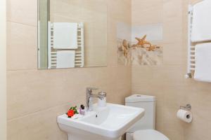 Koupelna v ubytování Boutique Hotel