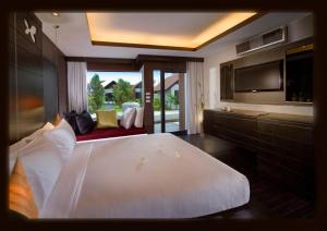 Voodi või voodid majutusasutuse Aava Resort and Spa toas