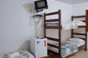 Postel nebo postele na pokoji v ubytování POUSADA DA ILHA
