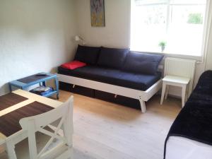 Posezení v ubytování Lilleledgaard studio