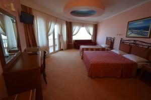 Postel nebo postele na pokoji v ubytování Hotel Aperio + 37 fotografií