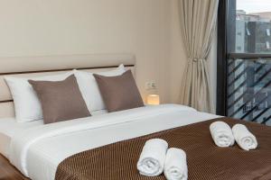 Postel nebo postele na pokoji v ubytování Boutique Hotel