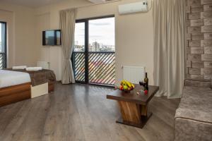 TV a/nebo společenská místnost v ubytování Boutique Hotel