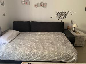 Łóżko lub łóżka w pokoju w obiekcie Alcalà Center A 5 minutos del paseo y playas