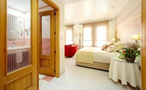 Posteľ alebo postele v izbe v ubytovaní Hotel Torrepalma