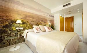 Posteľ alebo postele v izbe v ubytovaní Hotel Torrepalma