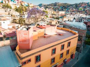 an overhead view of a city with a building at Hotel Real de Leyendas in Guanajuato