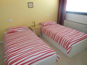 Łóżko lub łóżka w pokoju w obiekcie B&B Relax