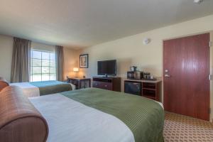 Letto o letti in una camera di Cobblestone Inn & Suites - Wray