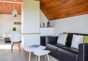 Posezení v ubytování B&B Plattestien