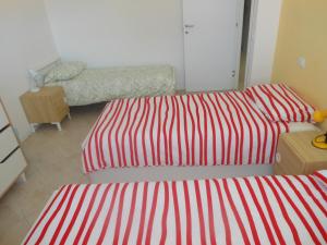 Łóżko lub łóżka w pokoju w obiekcie B&B Relax