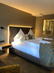 Voodi või voodid majutusasutuse Hotel Restaurant Der Engel, Sasbachwalden toas