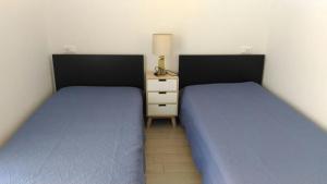 A bed or beds in a room at Levanto House