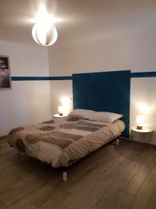 Katil atau katil-katil dalam bilik di 2 impasse de l'eglise