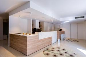 Kuchyň nebo kuchyňský kout v ubytování Hotel Al Sole Bardolino