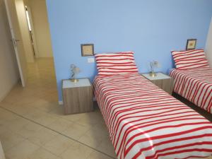 Łóżko lub łóżka w pokoju w obiekcie B&B Relax