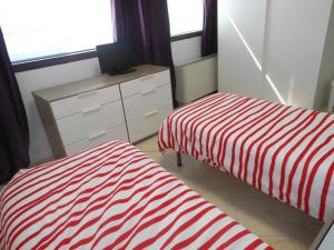 Łóżko lub łóżka w pokoju w obiekcie B&B Relax