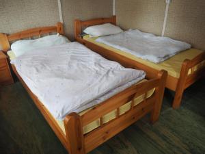 Postel nebo postele na pokoji v ubytování Camping Anastazja
