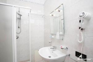 Koupelna v ubytování Porto Cesareo Hotel