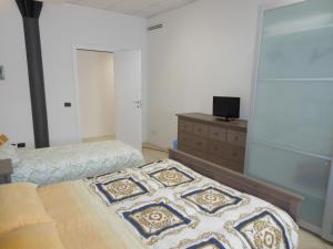 Łóżko lub łóżka w pokoju w obiekcie B&B Relax