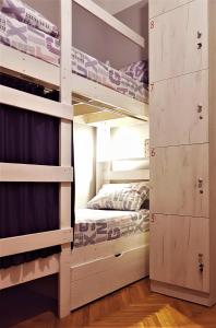 a bunk bed room with two bunk beds at Bulgakoff in Kyiv