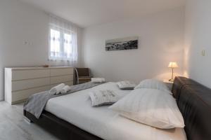 Łóżko lub łóżka w pokoju w obiekcie Villa Deni by Rent Istria
