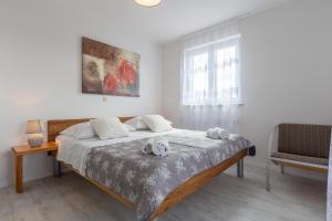 Łóżko lub łóżka w pokoju w obiekcie Villa Deni by Rent Istria
