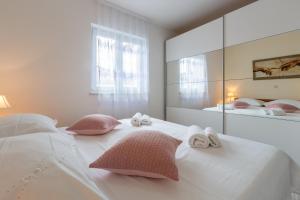 Łóżko lub łóżka w pokoju w obiekcie Villa Deni by Rent Istria