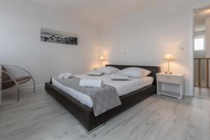 Łóżko lub łóżka w pokoju w obiekcie Villa Deni by Rent Istria