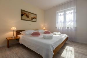 Łóżko lub łóżka w pokoju w obiekcie Villa Deni by Rent Istria