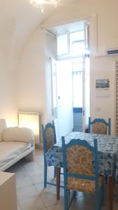 Posteľ alebo postele v izbe v ubytovaní Penisola Apartment