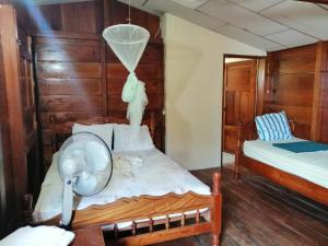 Voodi või voodid majutusasutuse Finca Magdalena Eco Lodge toas