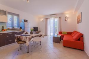 Kuchyň nebo kuchyňský kout v ubytování Apartman Madlen
